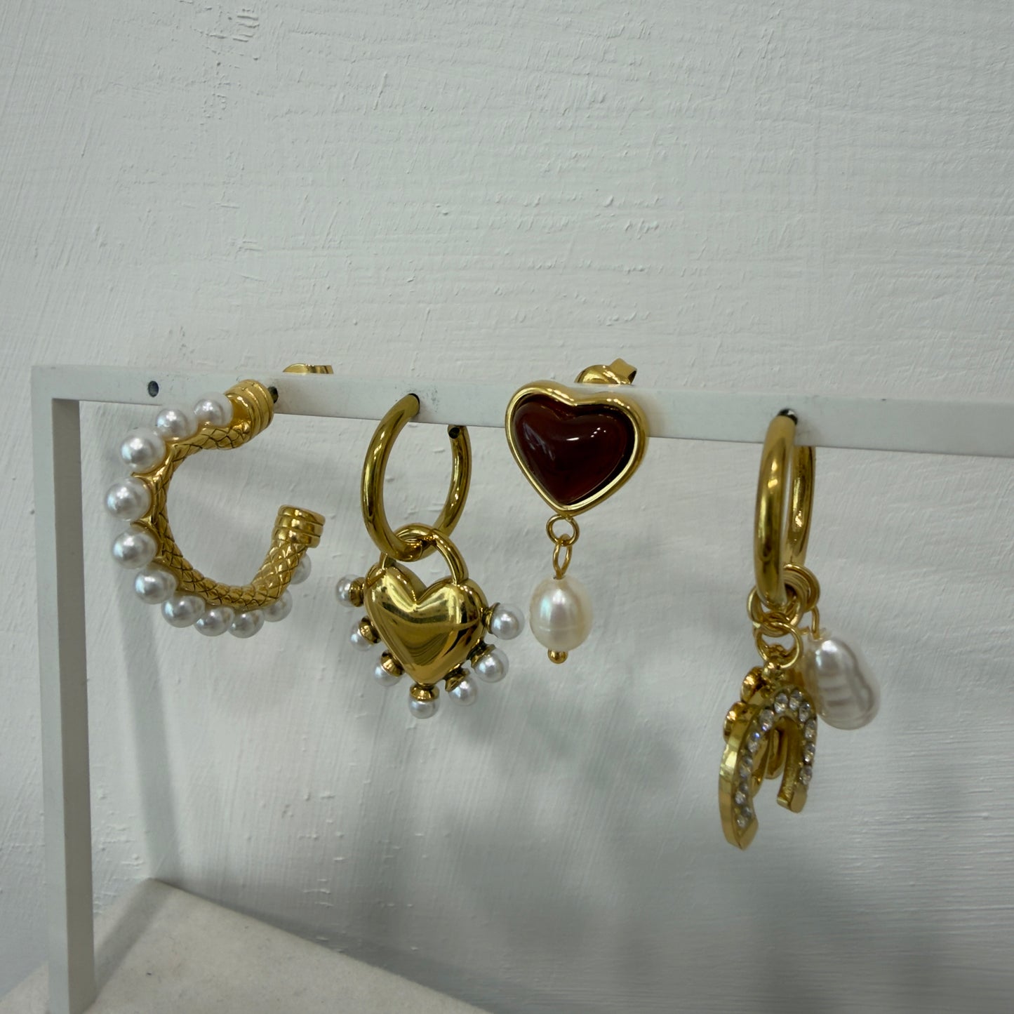Orecchini charm