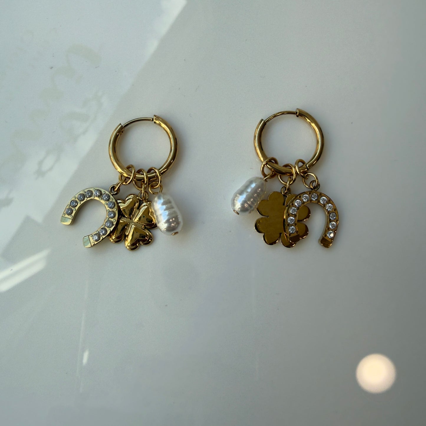 Orecchini charm